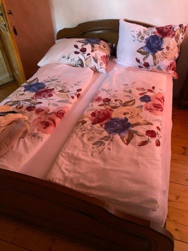 Ein Bett oder Betten in einem Zimmer der Unterkunft Apartma Jožica in Tonček