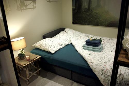 Una cama o camas en una habitación de Cocon d'Argile