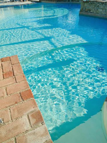 Piscina en o cerca de Mulino Di Quercegrossa