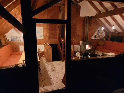 a view of a kitchen from the door of a room at Chalet Chalon in Meillerie