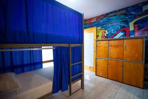 Postel nebo postele na pokoji v ubytování Hostal El Bando