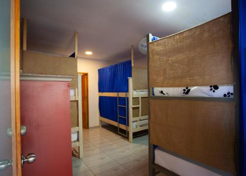 Postel nebo postele na pokoji v ubytování Hostal El Bando