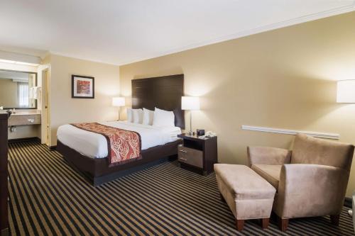 Ένα ή περισσότερα κρεβάτια σε δωμάτιο στο Best Western - McKenzie