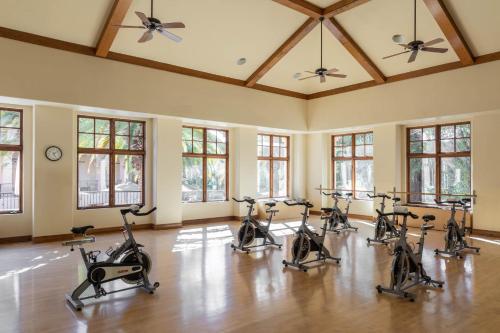 a row of exercise bikes in a room with windows at Fairmont Sonoma Mission Inn & Spa in Sonoma