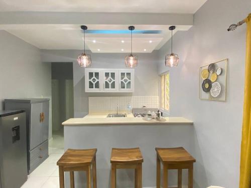 Kuchyň nebo kuchyňský kout v ubytování Apartamentos Melya cerca de la Playa Caleta