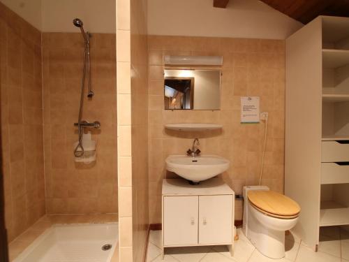 a bathroom with a sink and a toilet and a shower at Appartement Les Carroz d'Arâches, 4 pièces, 8 personnes - FR-1-572-127 in Arâches-la-Frasse