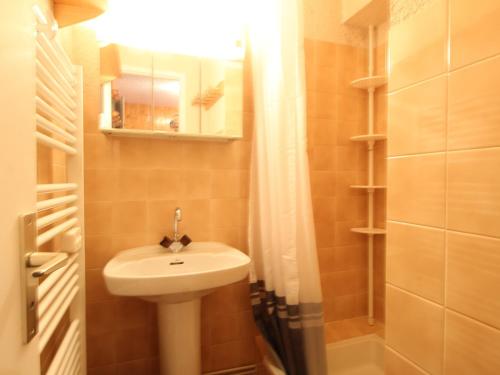 a small bathroom with a sink and a shower at Appartement Les Carroz d'Arâches, 2 pièces, 6 personnes - FR-1-572-97 in Arâches-la-Frasse