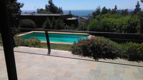 Vista de la piscina de Casas Condominio Pingueral o alrededores