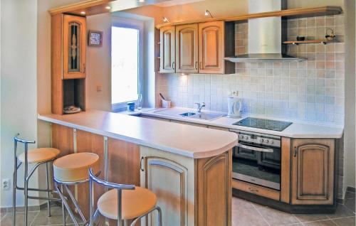 A kitchen or kitchenette at Holiday home Rowy Ul.Jaworowa