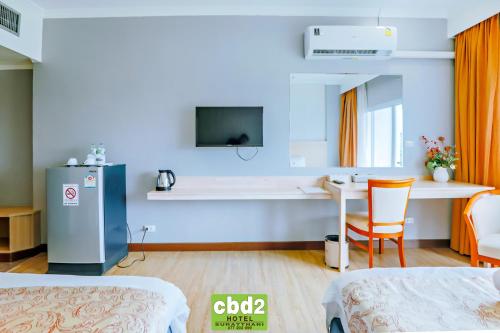 Un ou plusieurs lits dans un hébergement de l'établissement CBD 2 Hotel