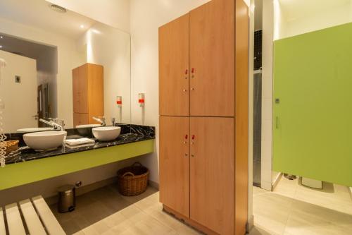 a bathroom with two sinks and a counter at Boutique Suites Palermo in Buenos Aires