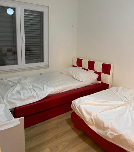 Ένα ή περισσότερα κρεβάτια σε δωμάτιο στο Villa Nikol