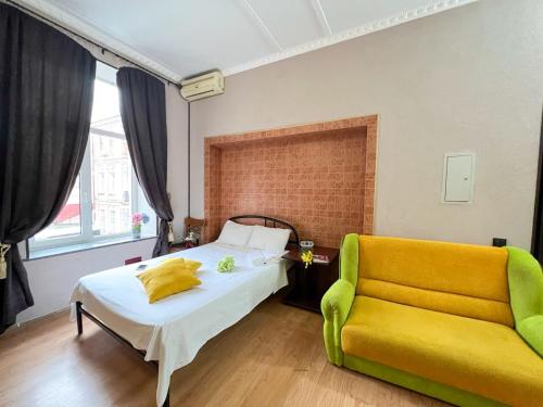 Ένα ή περισσότερα κρεβάτια σε δωμάτιο στο Apartment in the historic center