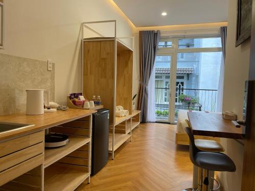 TV a/nebo společenská místnost v ubytování Feliz Dalat Homestay