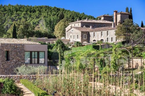a house on top of a hill at Château de Berne in Lorgues