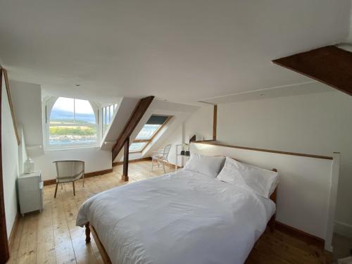 Ένα ή περισσότερα κρεβάτια σε δωμάτιο στο Frobisher Apartments