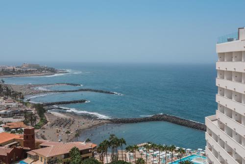 a view of the beach from a building at Iberostar Waves Bouganville Playa in Adeje