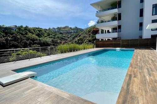 Фотография из галереи Mititai condo sea view & pool the quiet place near the airport в Фааа