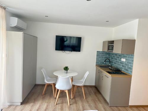 Dapur atau dapur kecil di Panoráma Apartman Mogyoród