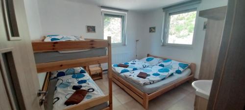 Postel nebo postele na pokoji v ubytování Chata U dědka