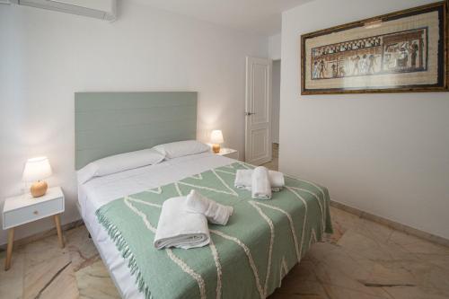 Posteľ alebo postele v izbe v ubytovaní Apartamento Tribalia Cadiz