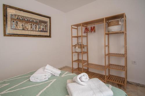 Posteľ alebo postele v izbe v ubytovaní Apartamento Tribalia Cadiz