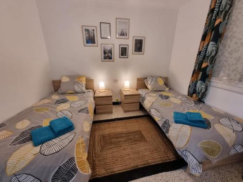 Posteľ alebo postele v izbe v ubytovaní Proche gare et centre-ville, 2 chambres cosy