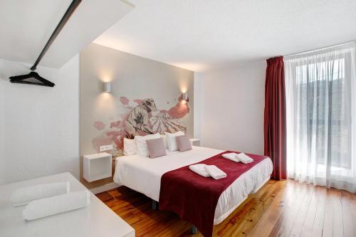 Postel nebo postele na pokoji v ubytování Linaje del Pago Listán Negro