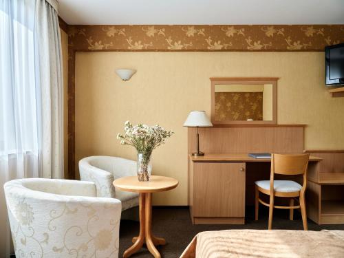 Televisyen dan/atau pusat hiburan di Hotel Great Polonia Kraków Airport