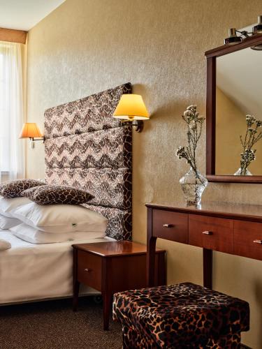 Katil atau katil-katil dalam bilik di Hotel Great Polonia Kraków Airport