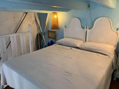 Postel nebo postele na pokoji v ubytování Casa del Pescatore