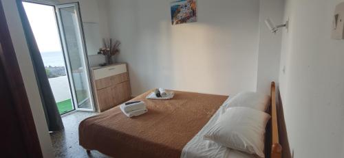 Postel nebo postele na pokoji v ubytování Paradise