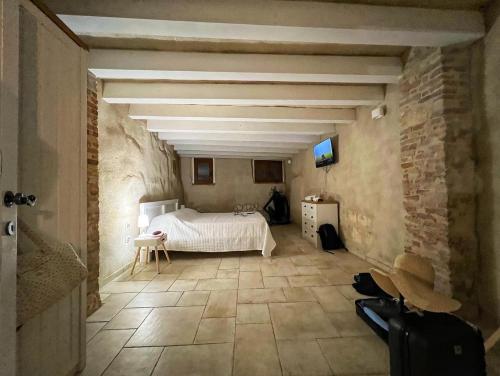 En eller flere senger på et rom på Castello Room & Spa
