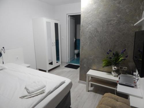 Ένα ή περισσότερα κρεβάτια σε δωμάτιο στο Rio Family Hotel