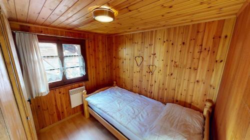 Cama ou camas em um quarto em Walliserhüs WH0