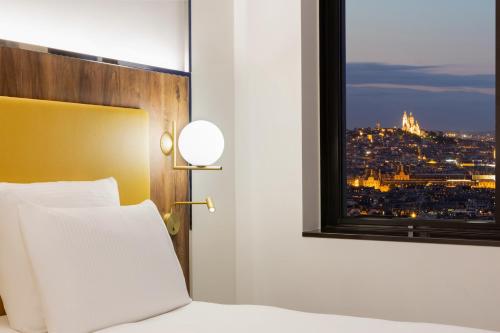 Katil atau katil-katil dalam bilik di Pullman Paris Montparnasse