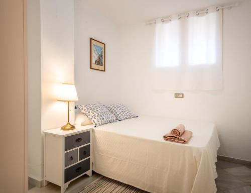 Postel nebo postele na pokoji v ubytování CABOPINO 3 BEDS APARTMENT