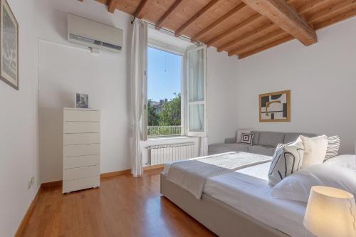 Posteľ alebo postele v izbe v ubytovaní Palazzo Manfredini Exclusive & Deluxe Apartment