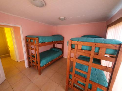 a room with two bunk beds in a room at Valle de leones in Cartagena