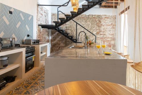Una cocina o zona de cocina en Hotel Voilá Getsemaní