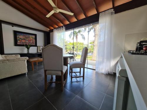 a kitchen and dining room with a table and chairs at Terrazas Vista Verde in Asunción