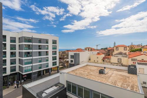 a view of a city from a building at Santa Luzia II by An Island Apart in Funchal