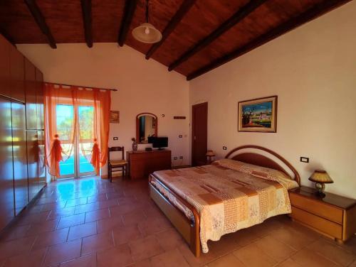 Postel nebo postele na pokoji v ubytování Il Casale di Bovo Marina