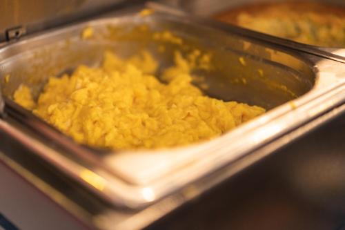 a tray filled with food in a toaster oven at Ibis Budget Lorena - Circuito da Fé in Lorena