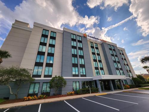 a rendering of a hotel with a parking lot at Comfort Suites Baymeadows Near Butler Blvd in Jacksonville
