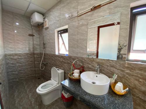 Koupelna v ubytování Phi Hung's Unique Homestay