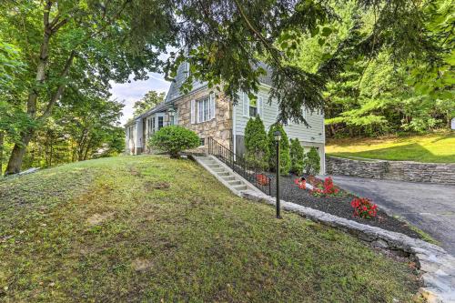 a house with a grassy hill in front of it at Large Private Yard Grand Worcester Getaway in Worcester