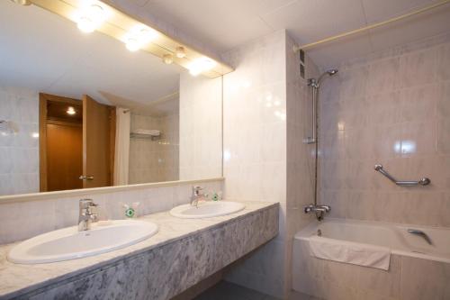 Koupelna v ubytování Hotel Domo