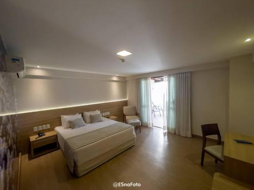 Ένα ή περισσότερα κρεβάτια σε δωμάτιο στο Vista Azul Hotel