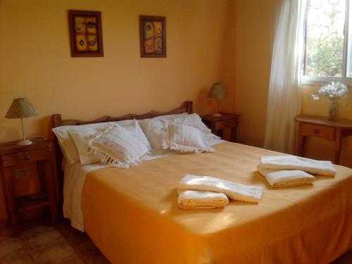 En eller flere senger på et rom på Wilka Pacha - Casas Serranas